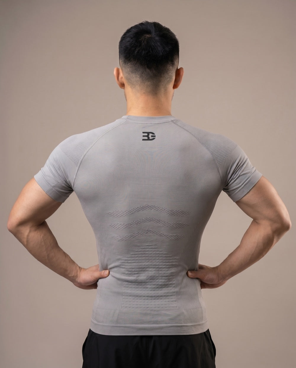 Gray textured compression shirt — back logo
